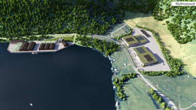 Bygninger og kai ved sjø